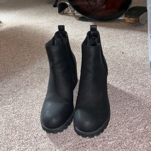 Never worn black heeled boots. Brand new!